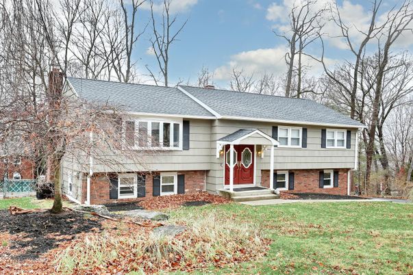 Exterior, Facade, Brick Facade, Raised Ranch