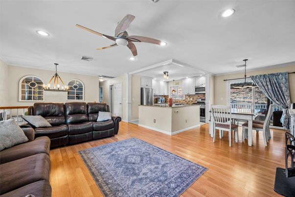 Dining room, Interior, Kitchen, Living room, Pendant Lights, Recessed Lighting, Stainless Steel Appliances, Wood Texture Flooring