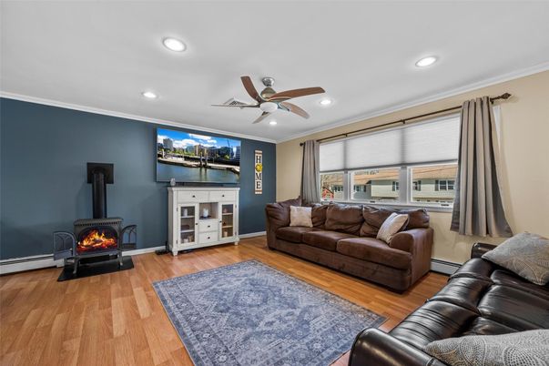 Fireplace, Interior, Living room, Recessed Lighting, Wood Texture Flooring