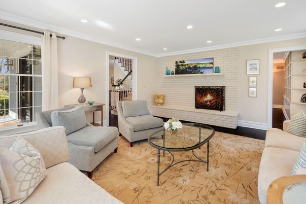 Fireplace, Interior, Living room, Recessed Lighting, Stone Walls, Wood Texture Flooring