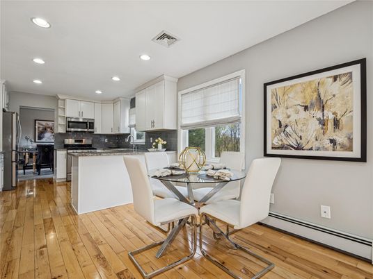 Dining room, Interior, Kitchen, Recessed Lighting, Stainless Steel Appliances, Wood Texture Flooring