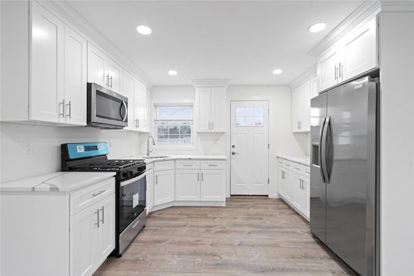 Interior, Kitchen, Recessed Lighting, Stainless Steel Appliances, Wood Texture Flooring