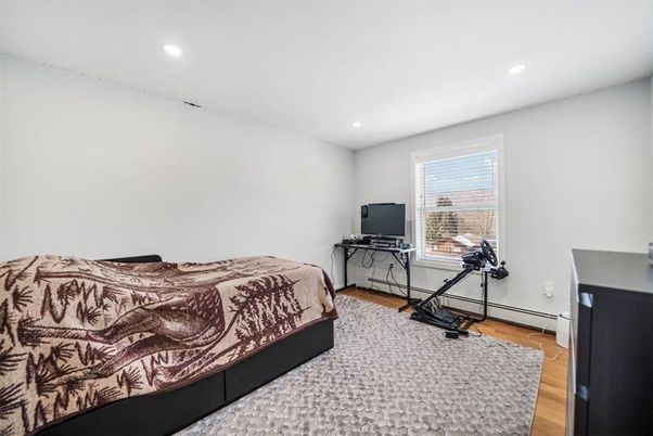 Bedroom, Fitness Equipment, Interior, Recessed Lighting, Wood Texture Flooring