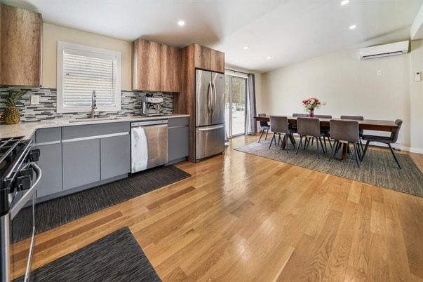 Dining room, Interior, Kitchen, Recessed Lighting, Stainless Steel Appliances, Wood Texture Flooring