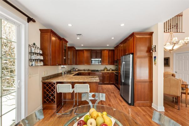 Dining room, Interior, Kitchen, Recessed Lighting, Stainless Steel Appliances, Wood Texture Flooring