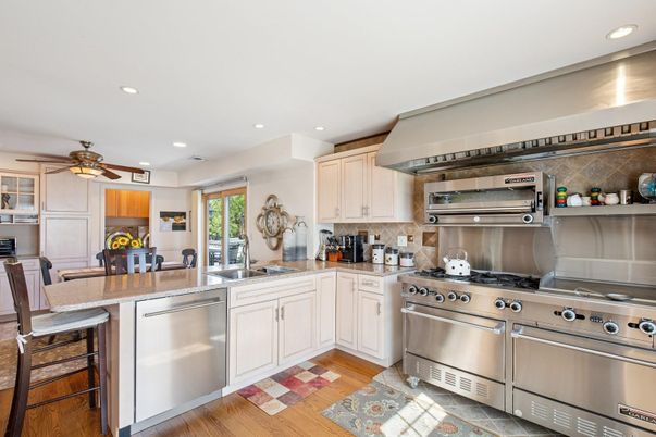 Dining room, Interior, Kitchen, Recessed Lighting, Stainless Steel Appliances, Wood Texture Flooring