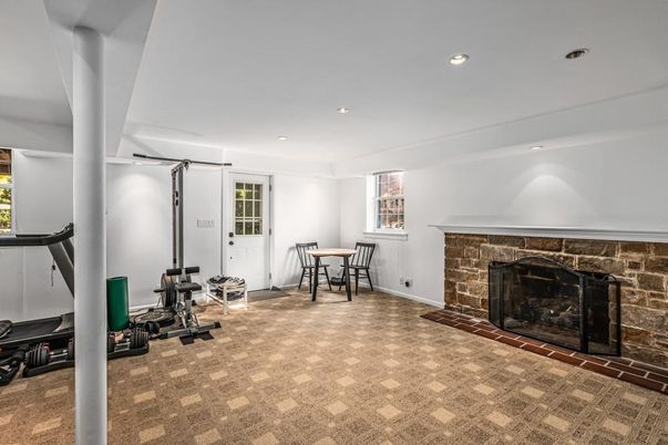Fireplace, Fitness Equipment, Interior, Recessed Lighting, Stone Walls