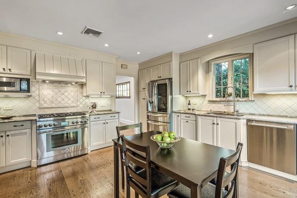 Dining room, Interior, Kitchen, Recessed Lighting, Stainless Steel Appliances, Wood Texture Flooring