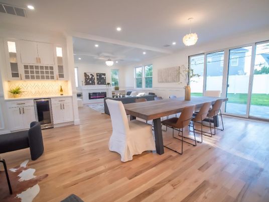 Dining room, Fireplace, Interior, Living room, Pendant Lights, Recessed Lighting, Wood Texture Flooring