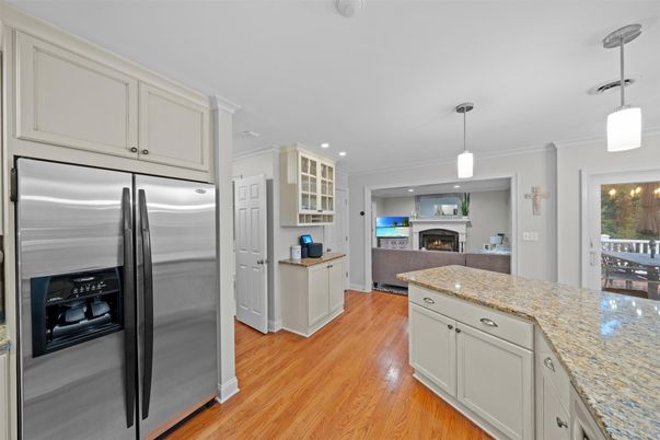 Fireplace, Interior, Kitchen, Pendant Lights, Recessed Lighting, Stainless Steel Appliances, Wood Texture Flooring