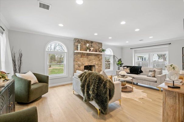Fireplace, Interior, Living room, Recessed Lighting, Stone Walls, Wood Texture Flooring