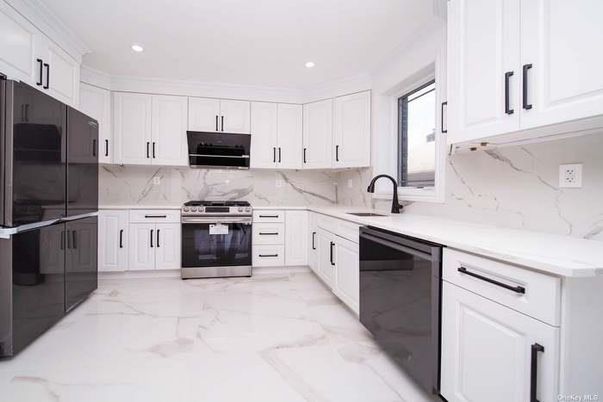 Interior, Kitchen, Marble, Marble Walls, Recessed Lighting, Stainless Steel Appliances