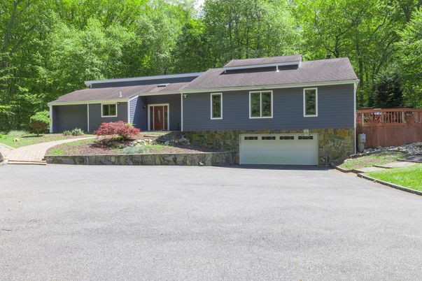 Attached, Exterior, Facade, Solar Panels, Raised Ranch