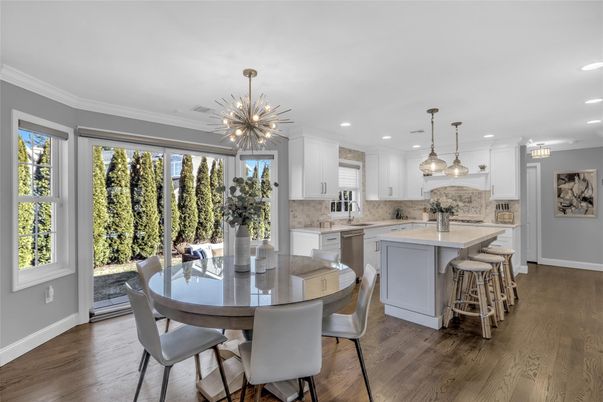 Dining room, Interior, Kitchen, Pendant Lights, Recessed Lighting, Stainless Steel Appliances, Wood Texture Flooring