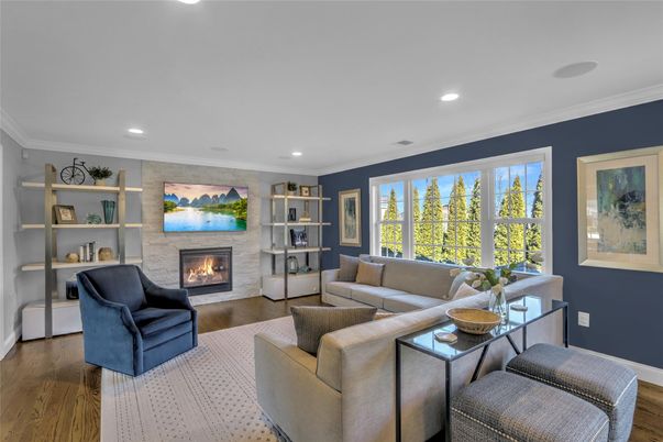 Fireplace, Interior, Living room, Recessed Lighting, Stone Walls, Wood Texture Flooring
