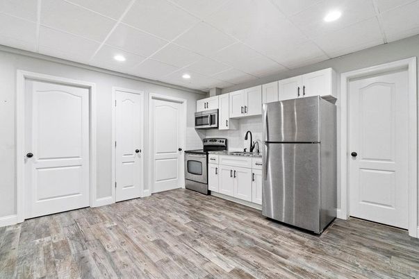 Interior, Kitchen, Recessed Lighting, Stainless Steel Appliances, Wood Texture Flooring