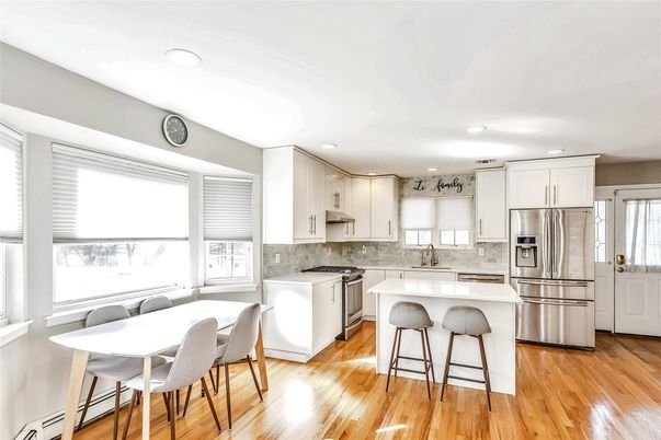 Dining room, Interior, Kitchen, Recessed Lighting, Stainless Steel Appliances, Wood Texture Flooring