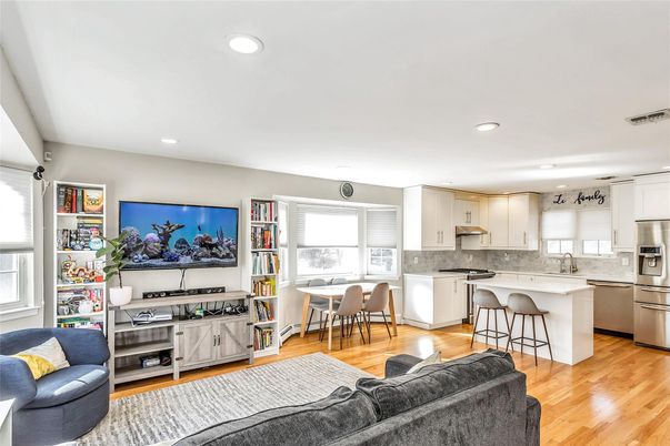 Dining room, Interior, Kitchen, Living room, Recessed Lighting, Stainless Steel Appliances, Wood Texture Flooring