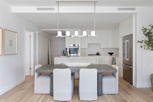 Dining room, Interior, Kitchen, Pendant Lights, Recessed Lighting, Stainless Steel Appliances, Wood Texture Flooring