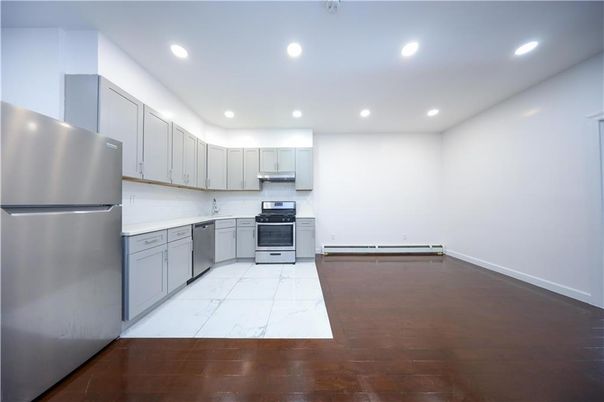 Interior, Kitchen, Marble, Recessed Lighting, Stainless Steel Appliances, Wood Texture Flooring