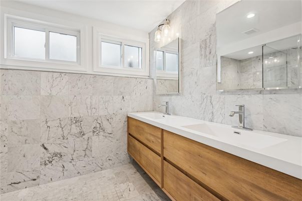 Bathroom, Dual Sink Vanities, Interior, Marble Walls, Recessed Lighting