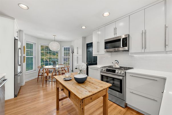 Chandelier, Dining room, Interior, Kitchen, Recessed Lighting, Stainless Steel Appliances, Wood Texture Flooring