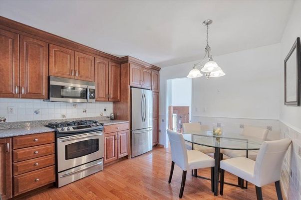 Dining room, Interior, Kitchen, Pendant Lights, Stainless Steel Appliances, Wood Texture Flooring