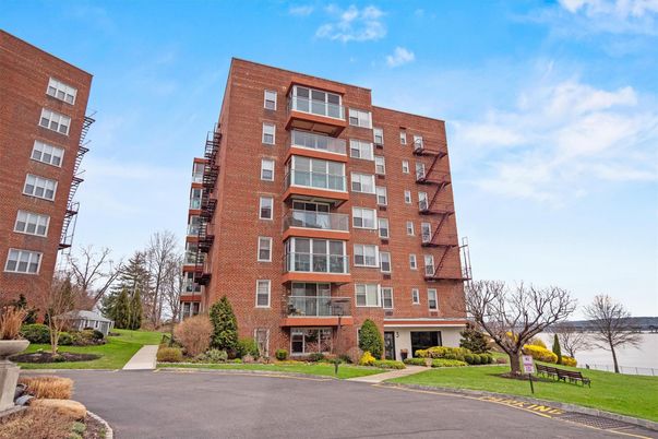 Exterior, Facade, Brick Facade, Condo Building