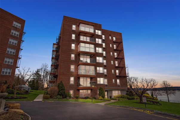 Exterior, Facade, Brick Facade, Condo Building