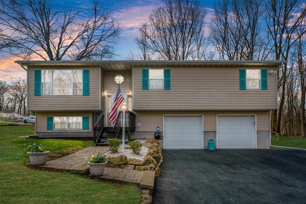 Attached, Exterior, Facade, Raised Ranch