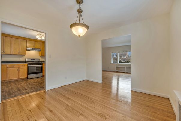 Empty room, Interior, Kitchen, Stainless Steel Appliances, Wood Texture Flooring