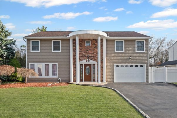 Attached, Exterior, Facade, Raised Ranch