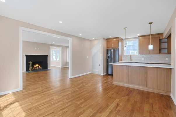 Fireplace, Interior, Kitchen, Pendant Lights, Recessed Lighting, Stainless Steel Appliances, Wood Texture Flooring