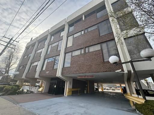 Exterior, Facade, Brick Facade, Condo Building
