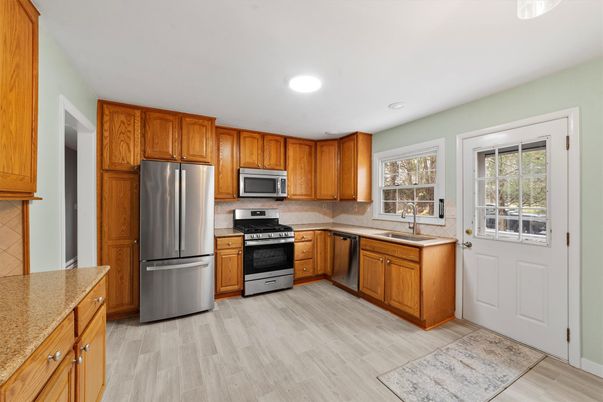 Interior, Kitchen, Recessed Lighting, Stainless Steel Appliances, Wood Texture Flooring
