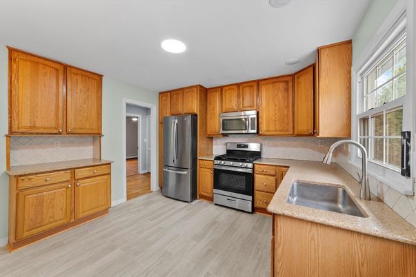 Interior, Kitchen, Recessed Lighting, Stainless Steel Appliances, Wood Texture Flooring