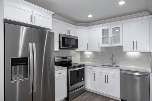 Interior, Kitchen, Recessed Lighting, Stainless Steel Appliances, Wood Texture Flooring