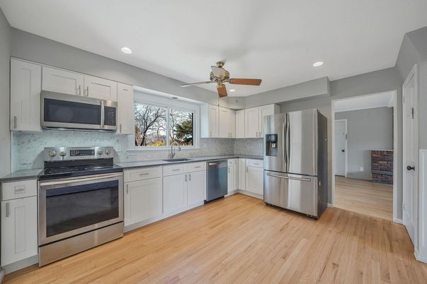 Interior, Kitchen, Recessed Lighting, Stainless Steel Appliances, Wood Texture Flooring