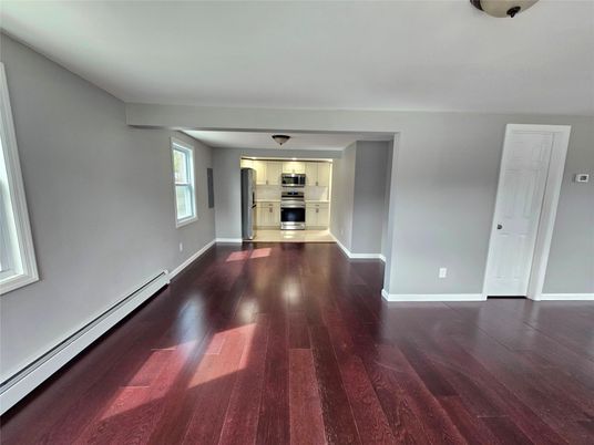 Empty room, Interior, Kitchen, Stainless Steel Appliances, Wood Texture Flooring