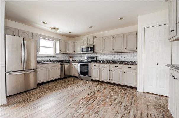 Interior, Kitchen, Recessed Lighting, Stainless Steel Appliances, Wood Texture Flooring
