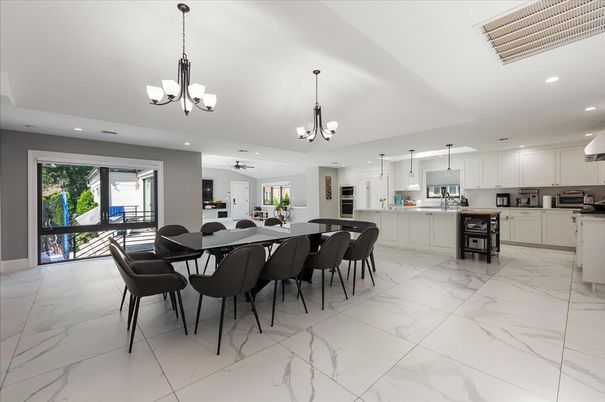 Chandelier, Dining room, Interior, Kitchen, Marble, Pendant Lights, Recessed Lighting, Stainless Steel Appliances