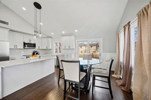 Dining room, Interior, Kitchen, Pendant Lights, Recessed Lighting, Stainless Steel Appliances, Wood Texture Flooring
