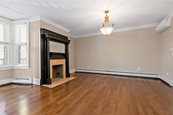 Empty room, Fireplace, Interior, Pendant Lights, Wood Texture Flooring