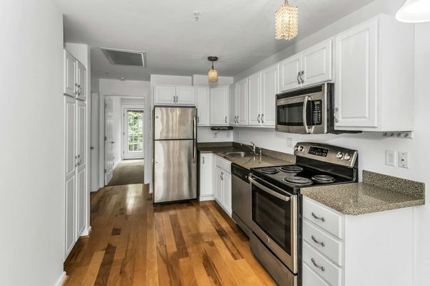 Chandelier, Interior, Kitchen, Pendant Lights, Stainless Steel Appliances, Wood Texture Flooring