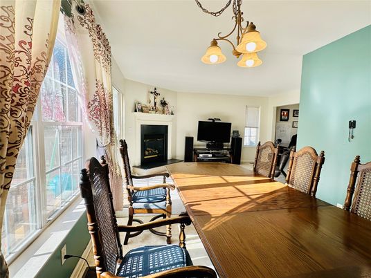 Dining room, Fireplace, Interior, Living room, Wood Texture Flooring