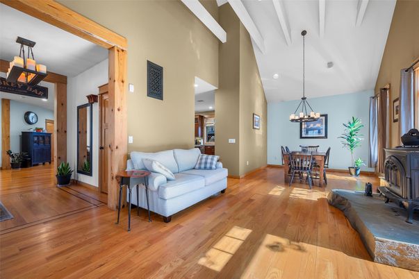Chandelier, Dining room, Fireplace, Interior, Pendant Lights, Recessed Lighting, Wood Texture Flooring