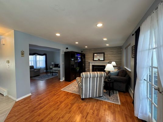 Fireplace, Interior, Living room, Recessed Lighting, Wood Texture Flooring