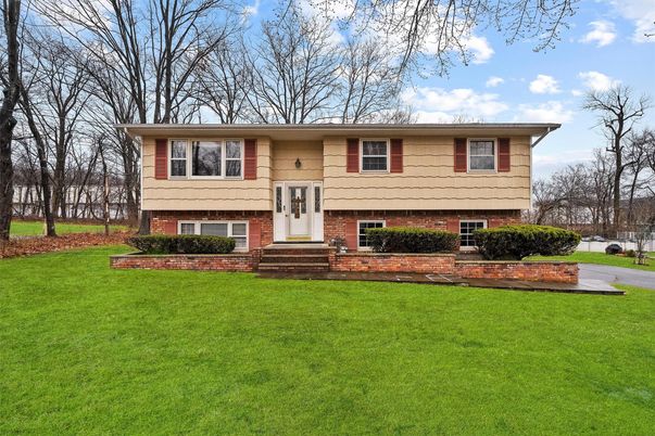 Exterior, Facade, Brick Facade, Raised Ranch