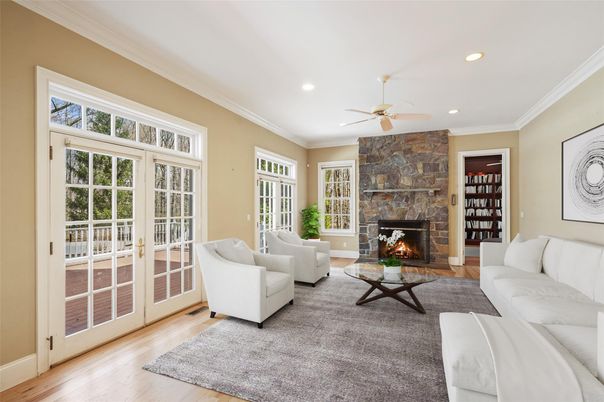 Fireplace, Interior, Living room, Recessed Lighting, Stone Walls, Wood Texture Flooring