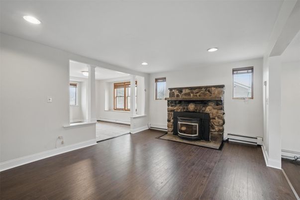 Empty room, Fireplace, Interior, Recessed Lighting, Wood Texture Flooring